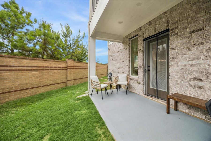 Enjoy the lighted patio just off the living room for easy indoor/outdoor living.