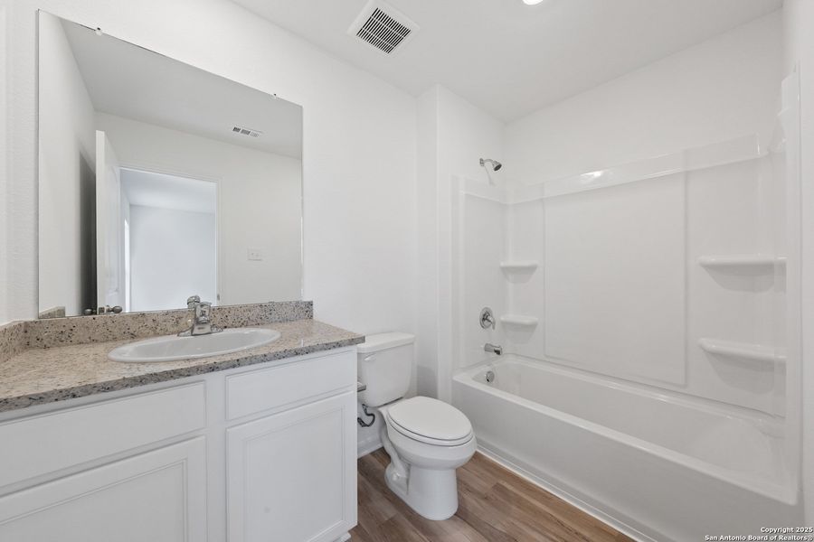 Furnished interior view inside a new home in Blue Wing, San Antonio (Image 9).