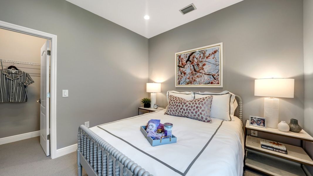 Representative furnished interior of a home built from the Dream 2 by Neal Communities in SkySail, Naples (Image 19).