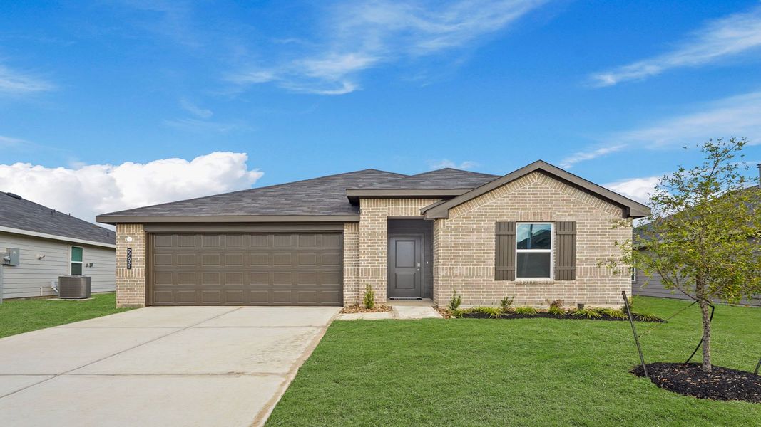 Front exterior of a new home in Grand Pines, Magnolia, TX, highlighting curb appeal (Image 1).