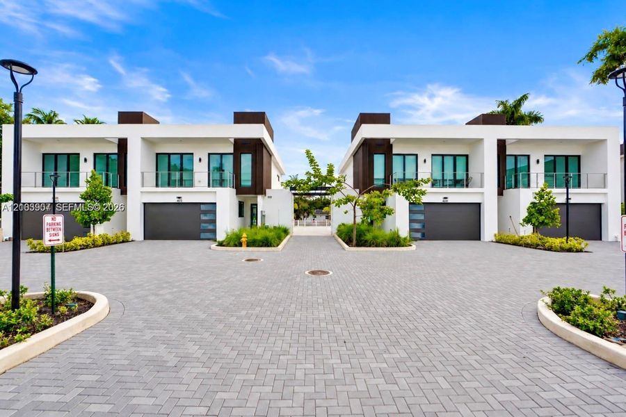 Front exterior of a new home in , Dania Beach, FL, highlighting curb appeal (Image 26).