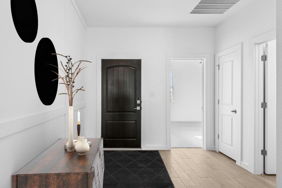 Welcoming foyer with feature wall (*Photo not of actual home and used for illustration purposes only.)