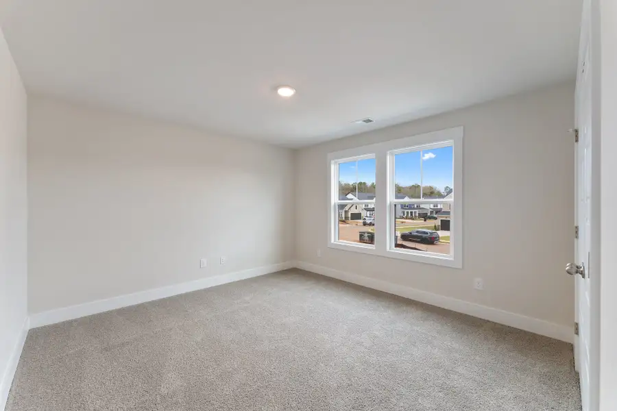 Representative unfurnished interior of a home built from the Callaham by Hunter Quinn Homes in The Meadows at Midway, Anderson (Image 11).