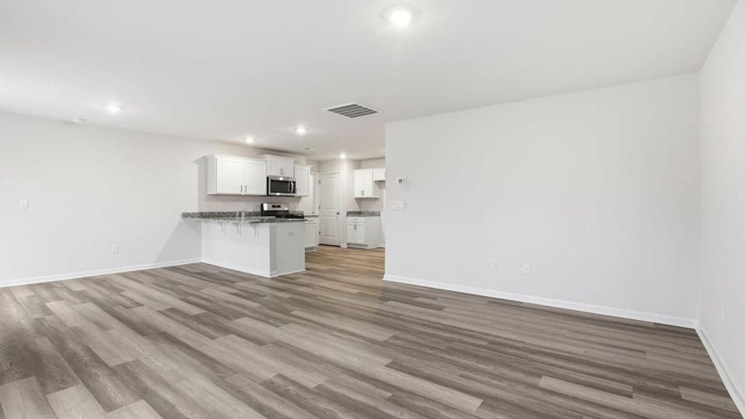 Spacious, unfurnished interior of a new home in Bentley Park, Greenwood (Image 17).