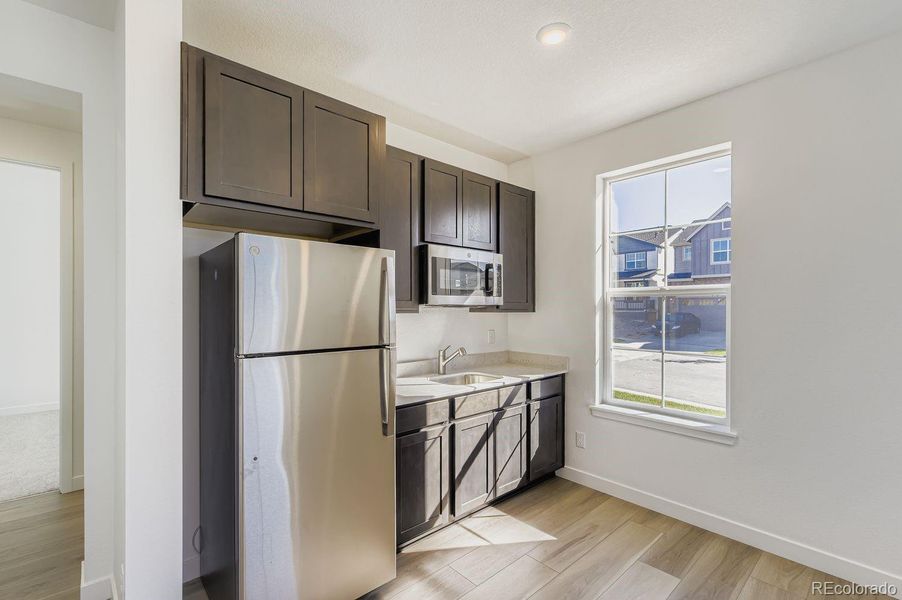 Furnished interior view inside a new home in Newlin Crossing: The Monarch Collection, Parker (Image 8). Furnished interior view inside a new home in Newlin Crossing: The Monarch Collection, Parker (Image 8).