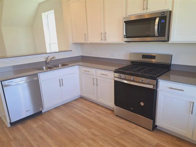 Furnished interior view inside a new home in Sunfield, Buda (Image 3). Furnished interior view inside a new home in Sunfield, Buda (Image 3).