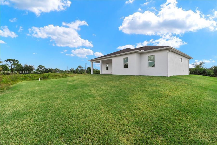 Exterior details and patio area of a home in , Lehigh Acres (Image 30).