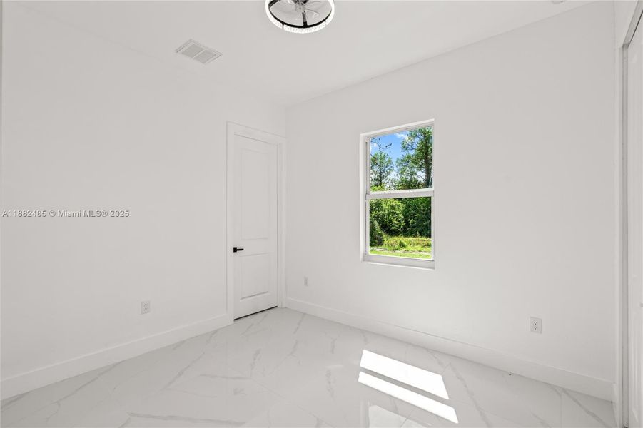 Spacious, unfurnished interior of a new home in , Lehigh Acres (Image 38).