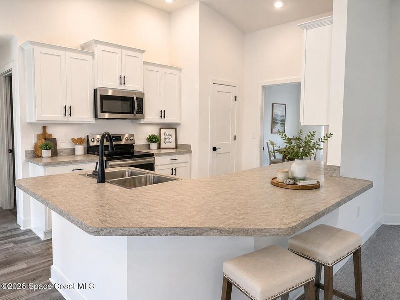 Furnished interior view inside a new home in Palm Bay, Palm Bay (Image 3). Furnished interior view inside a new home in Palm Bay, Palm Bay (Image 3).