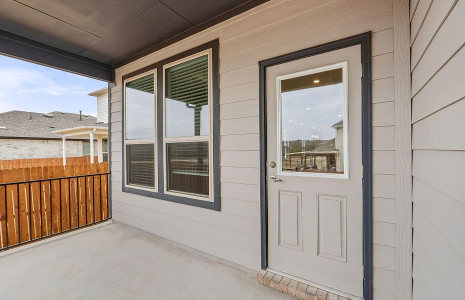Exterior details and patio area of a home in Saddleback at Santa Rita Ranch, Liberty Hill (Image 18).