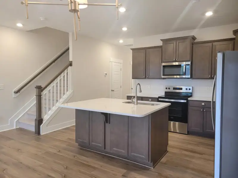 Furnished interior view inside a new home in 1158 Place Townhomes, Wilson (Image 4).