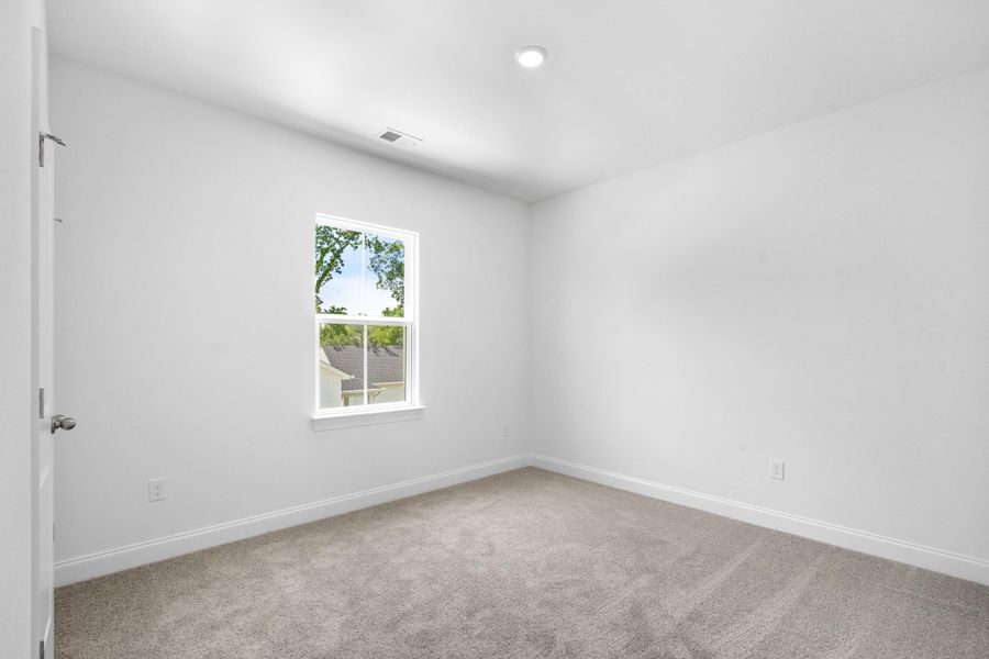 Spacious, unfurnished interior of a new home in Downtown Loris Homes, Loris (Image 39).