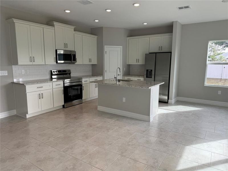 Furnished interior view inside a new home in , North Port (Image 6).