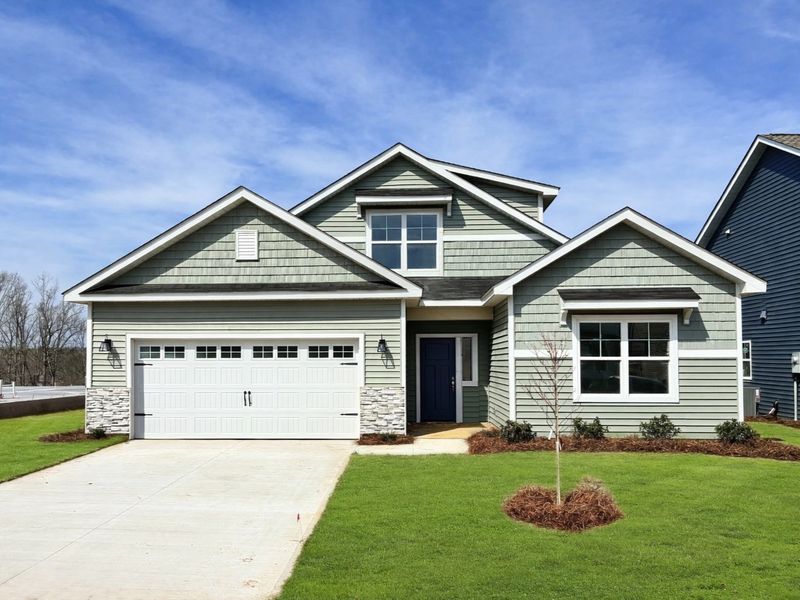 Front exterior of a new home in Holly Ridge, Greenville, SC, highlighting curb appeal (Image 1). Front exterior of a new home in Holly Ridge, Greenville, SC, highlighting curb appeal (Image 1).