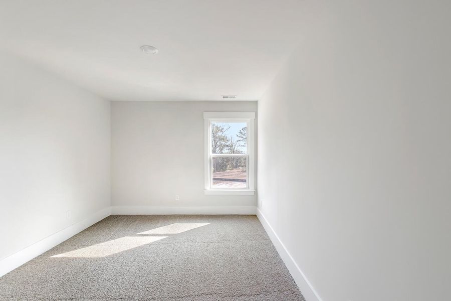 Spacious, unfurnished interior of a new home in Rivers Reach, Yemassee (Image 22).