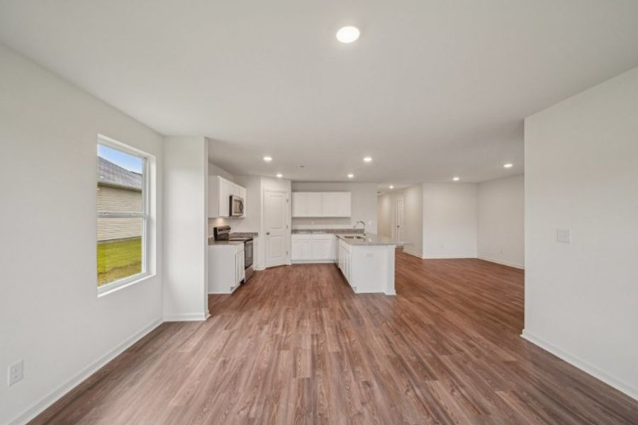 A large empty living room. A large empty living room.