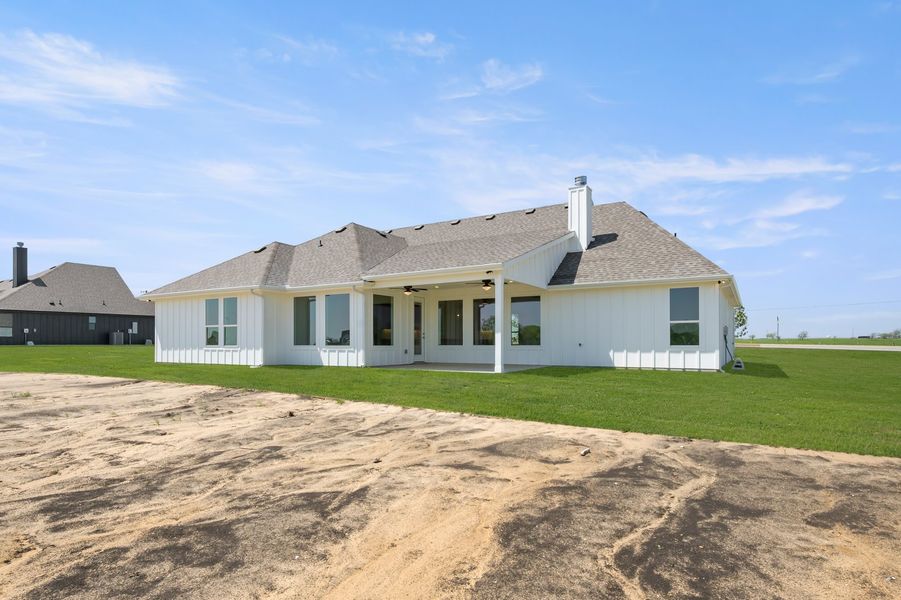 Front exterior of a new home in Carrera Ranch, Waxahachie, TX, highlighting curb appeal (Image 26).
