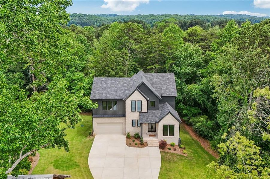 Front exterior of a new home in , Cumming, GA, highlighting curb appeal (Image 31).