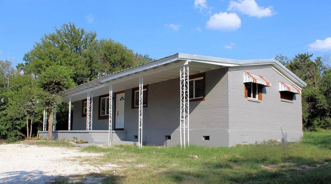 Exterior details and patio area of a home in , Whitney (Image 10).