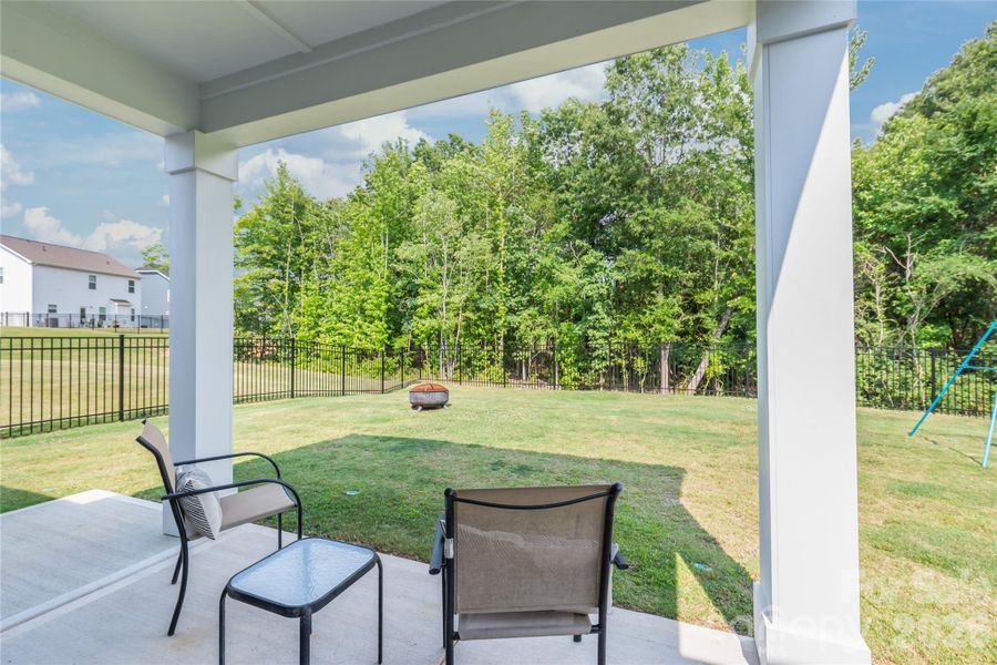 Exterior details and patio area of a home in Medlin Forest, Monroe (Image 2). Exterior details and patio area of a home in Medlin Forest, Monroe (Image 2).