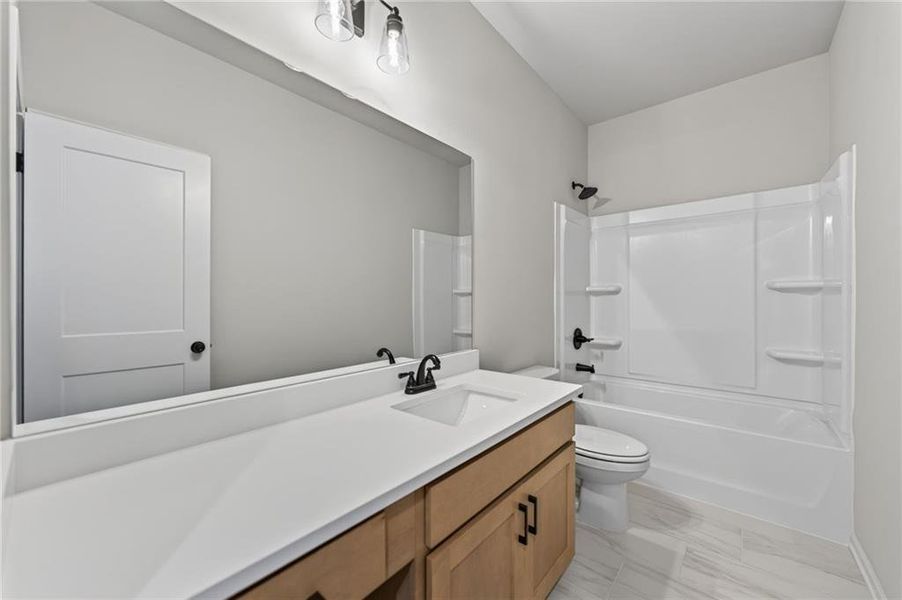 Furnished interior view inside a new home in , Loganville (Image 13).
