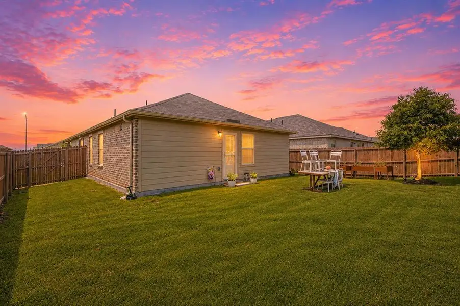 Twilight view of 1028 Naranjos Dr, Haslet TX in Rancho Canyon