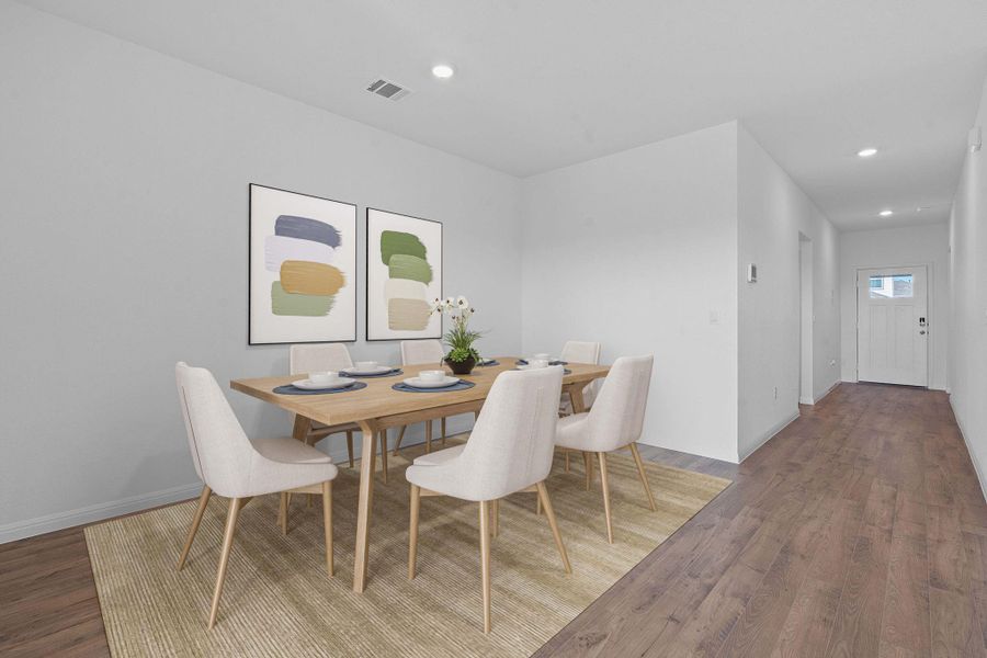 Dining room featuring recessed lighting and wood finished floors