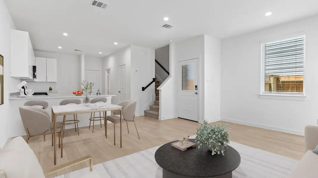 Furnished interior view inside a new home in Lexington Village, Missouri City (Image 7).