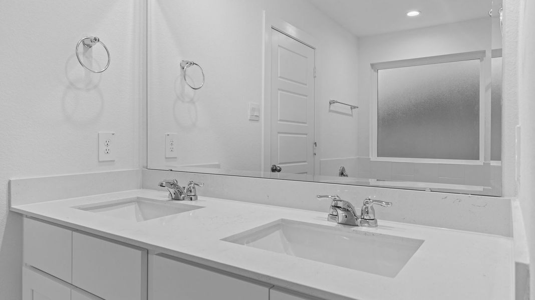 Furnished interior view inside a new home in Caldwell Crossing, Iowa Colony (Image 9).