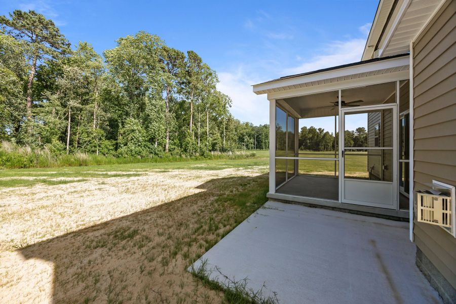 Front exterior of a new home in Laurel Oaks, Greenville, NC, highlighting curb appeal (Image 34). Front exterior of a new home in Laurel Oaks, Greenville, NC, highlighting curb appeal (Image 34).