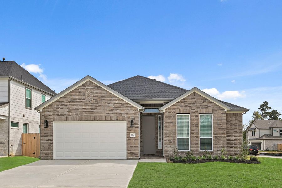 Front exterior of a new home in Barton Creek Ranch, Conroe, TX, highlighting curb appeal (Image 20).