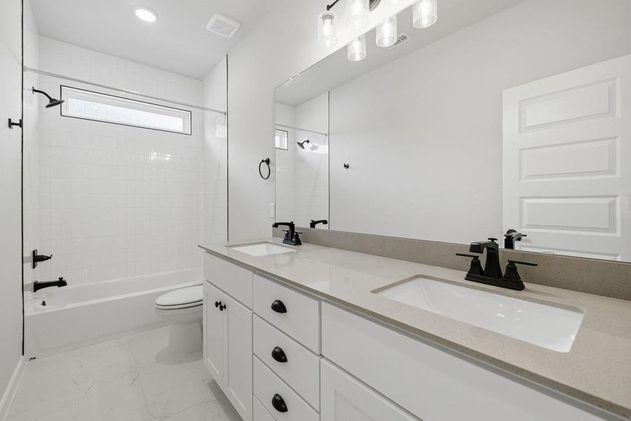 Furnished interior view inside a new home in Heritage, Dripping Springs (Image 9).