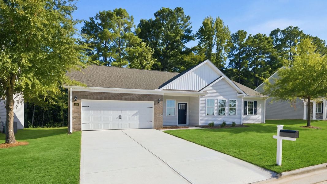 Front exterior of a new home in Tyler - Home on the Lake, New Bern, NC, highlighting curb appeal (Image 17).