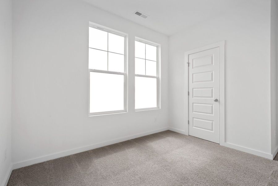 Spacious, unfurnished interior of a new home in Sage Farms, White House (Image 65).