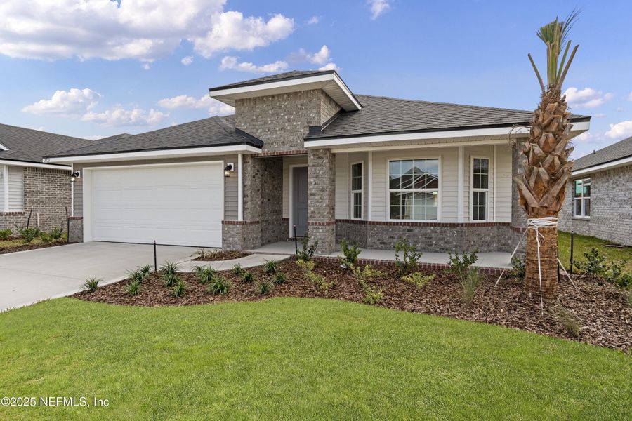 Front exterior of a new home in , Green Cove Springs, FL, highlighting curb appeal (Image 16). Front exterior of a new home in , Green Cove Springs, FL, highlighting curb appeal (Image 16).