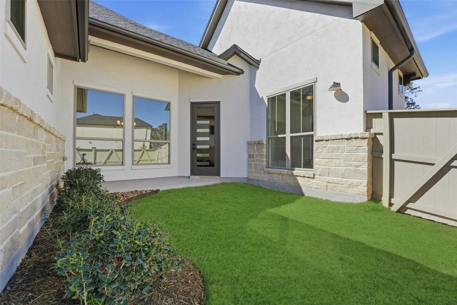 Exterior details and patio area of a home in Audubon 80’s, Magnolia (Image 19).