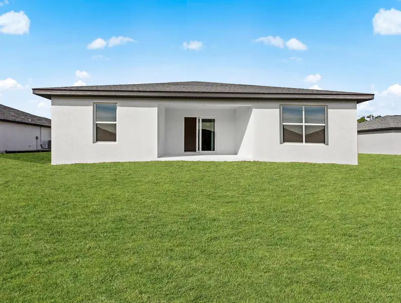 Exterior details and patio area of a home in Palm Bay Spot Lots, Palm Bay (Image 2).