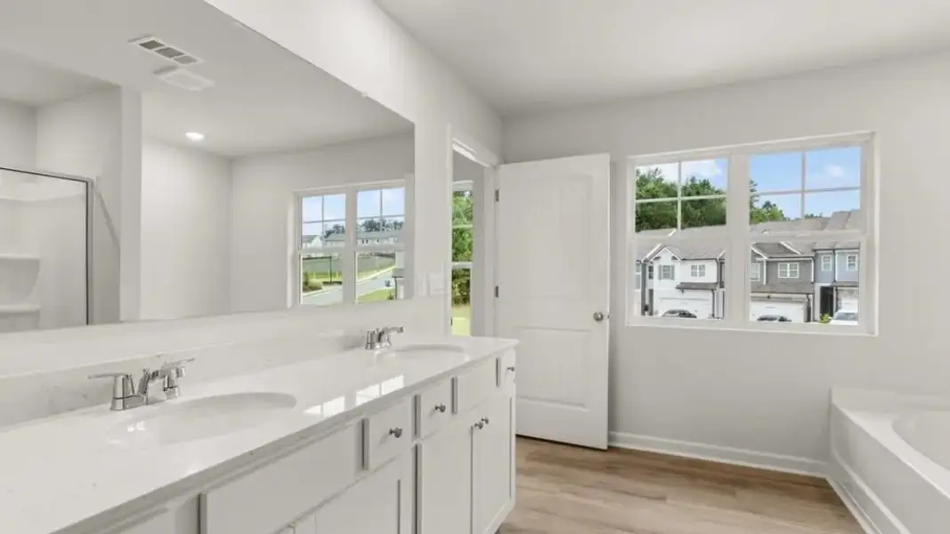 Furnished interior view inside a new home in Waypoint, Flowery Branch (Image 6).