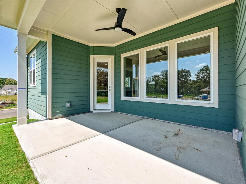 Exterior details and patio area of a home in Encore at Streamside - Tradition Series, Waxhaw (Image 4).
