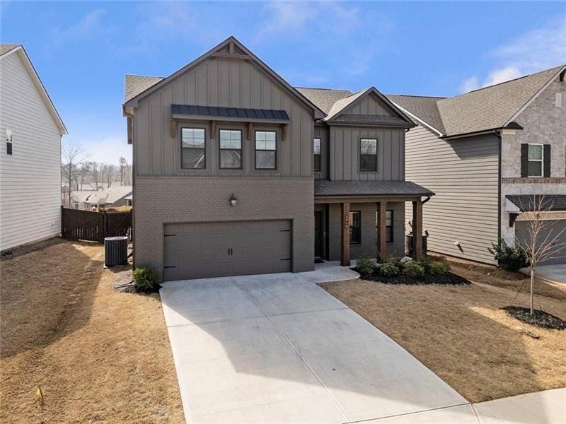 Front exterior of a new home in , Gainesville, GA, highlighting curb appeal (Image 24). Front exterior of a new home in , Gainesville, GA, highlighting curb appeal (Image 24).