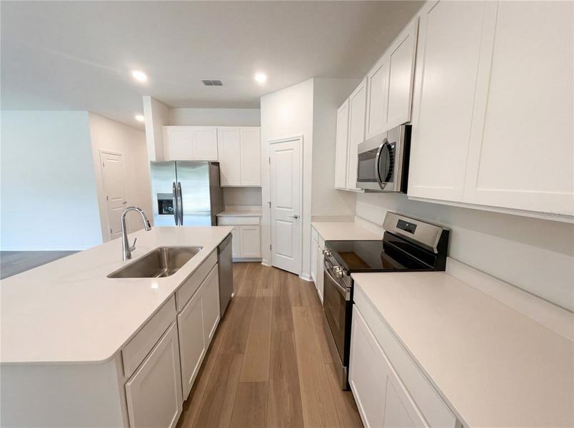 Furnished interior view inside a new home in Grand Park, Dunnellon (Image 8).