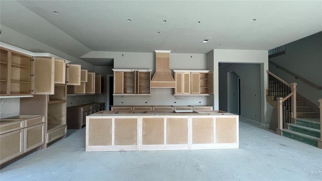 Cabinets and countertops galore in this huge kitchen!