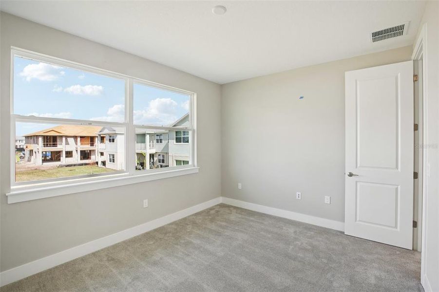 Spacious, unfurnished interior of a new home in Lagoon Residences at Epperson, Wesley Chapel (Image 20).