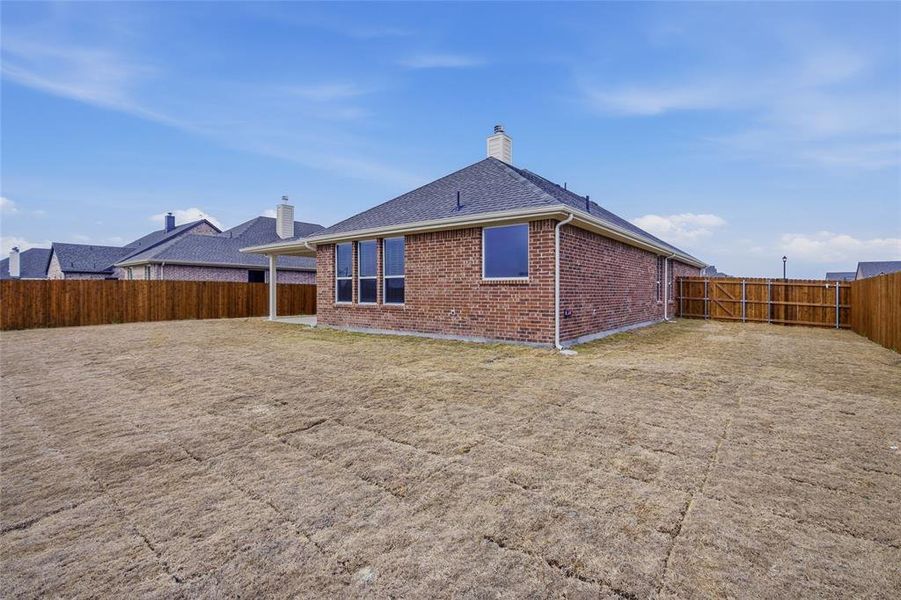 Exterior details and patio area of a home in Aero Vista, Caddo Mills (Image 22).