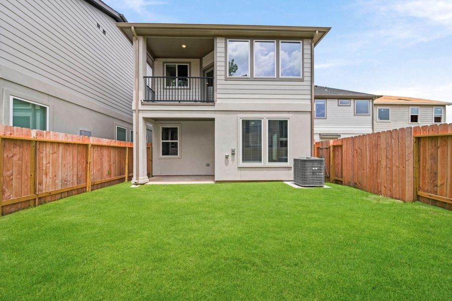 Exterior details and patio area of a home in Park Hill Villas, Stafford (Image 15).