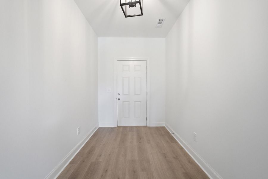 Spacious, unfurnished interior of a new home in Dorris Farm, White House (Image 23).