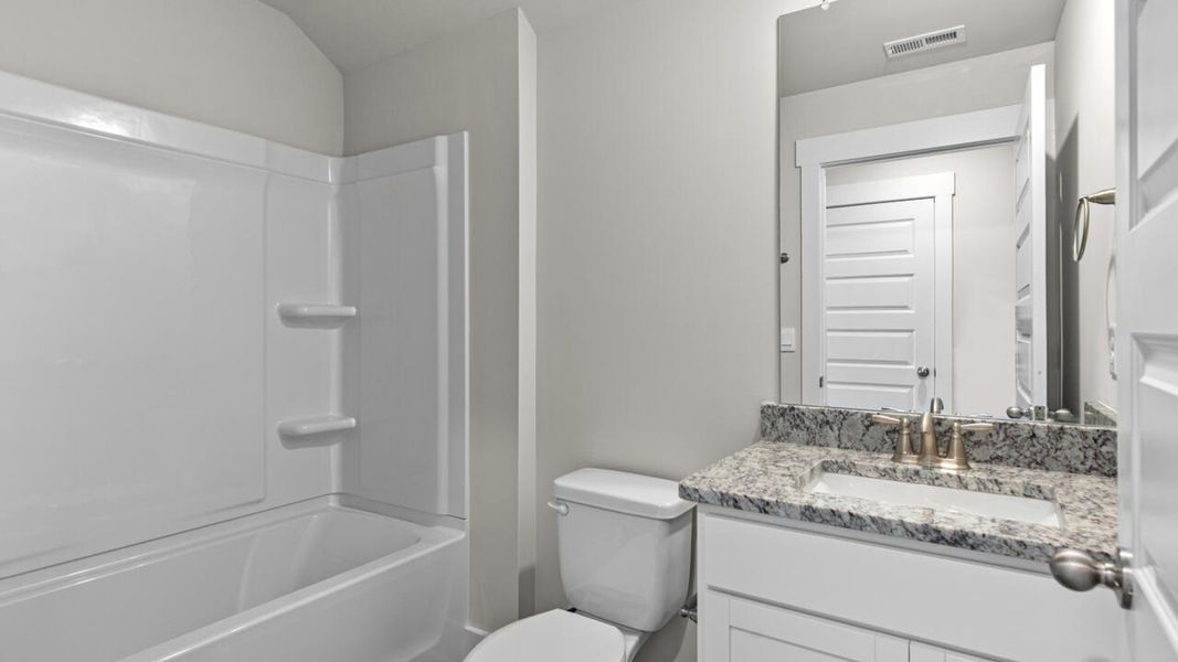 Furnished interior view inside a new home in Indigo Preserve, Leland (Image 13).