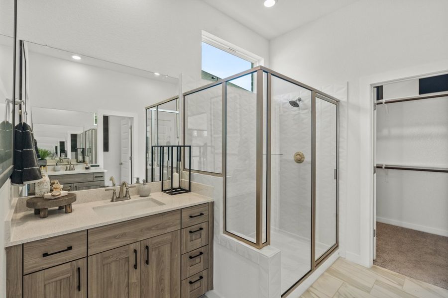 Representative furnished interior of a home built from the Peyton by Chesmar Homes in University Heights, Round Rock (Image 10).