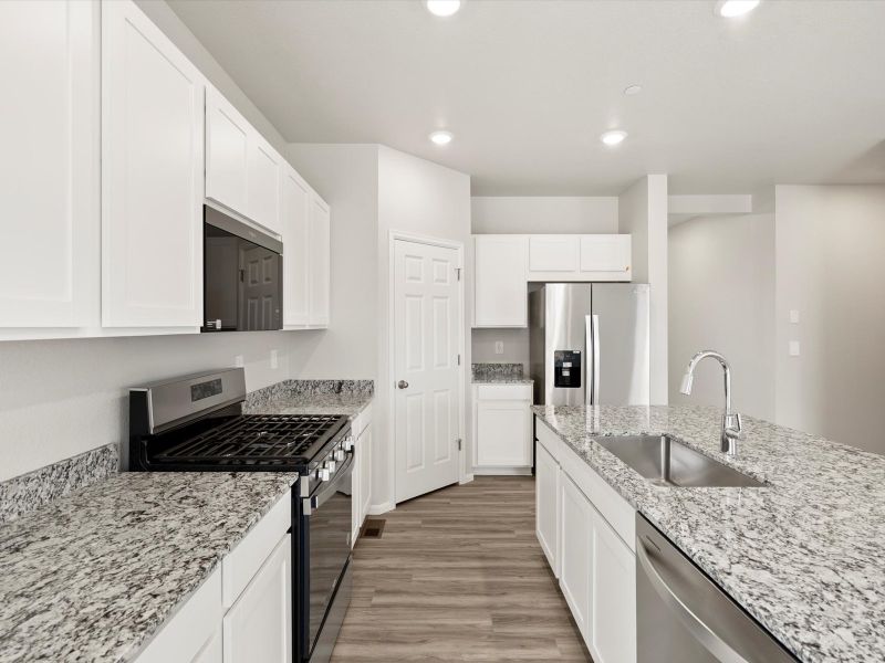 Furnished interior view inside a new home in Buffalo Highlands: The Flora Collection, Commerce City (Image 5).