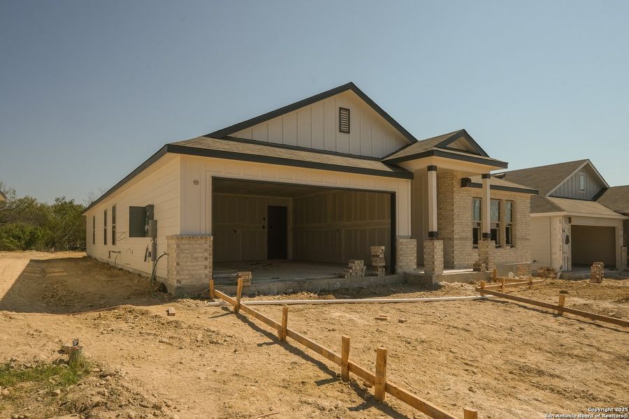 Exterior details and patio area of a home in Greenspoint Heights, Seguin (Image 3). Exterior details and patio area of a home in Greenspoint Heights, Seguin (Image 3).